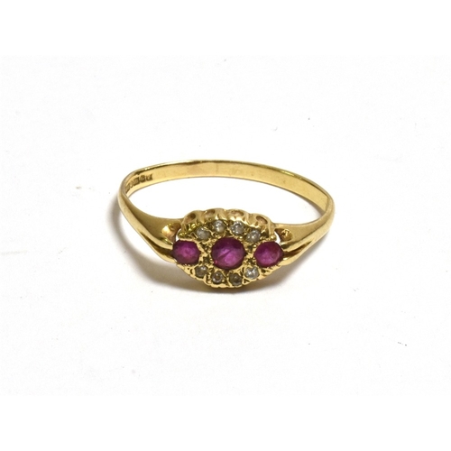 52 - THREE 9CT GOLD GEM SET RINGS To include; a navette shaped cluster set with round rubies and single c... 