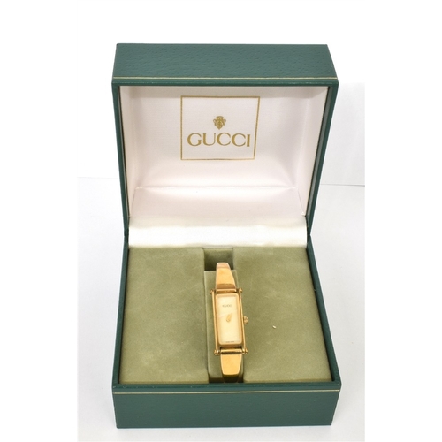 65 - LADIES GUCCI WRISTWATCH 12.2mm wide rectangular gold plated case, signed Gucci reference 1500, mothe... 