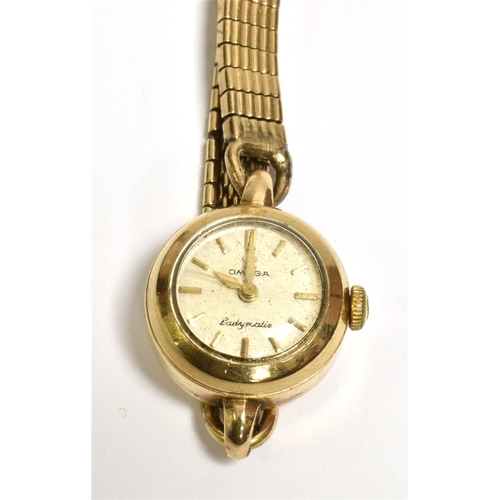 68 - LADIES 9CT GOLD OMEGA DRESS WATCH 18.0mm round case, stamped 9.375, champagne coloured dial signed O... 