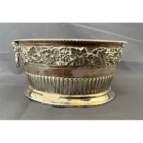 87 - EDWARDIAN SILVER FRUIT BOWL Decorated with grape vine motif repousse work, and handles featuring Ram... 