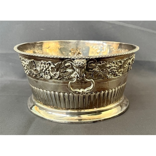 87 - EDWARDIAN SILVER FRUIT BOWL Decorated with grape vine motif repousse work, and handles featuring Ram... 