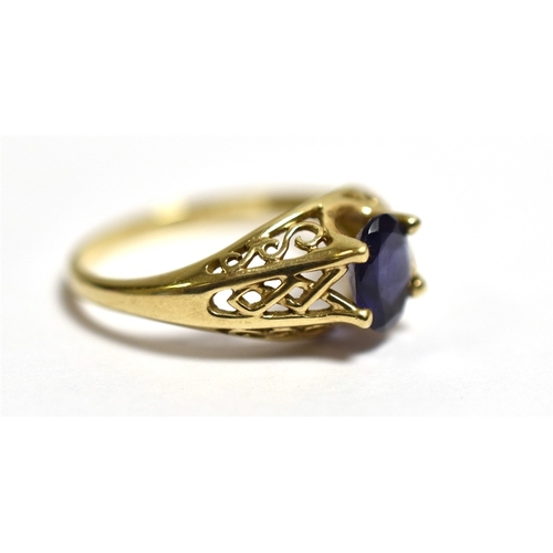 9 - 9CT GOLD & TANZANITE RING Claw set with a 7.3 x 5.9mm oval tanzanite, estimated in the setting as 1.... 