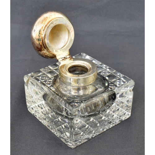 90 - EDWARDIAN SILVER MOUNTED INKWELL On 9cm square hob nail cut crystal base, with hinged sterling silve... 