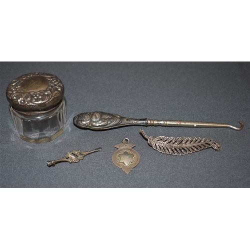 94 - ANTIQUE SILVER ITEMS to include a silver lidded cosmetic pot, silver handled button hook, 7cm long m... 