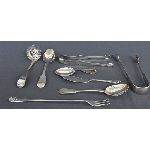 96 - ANTIQUE SILVER TONGS & SPOONS including two sugar tongs, one Georgian & decorated with bright cut en... 