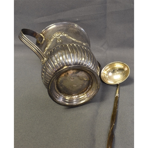 110 - GEORGIAN SILVER CHALICE & LADLE chalice standing 11.4cm tall, decorated with embossed floral and fol... 