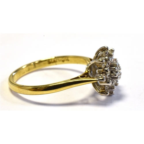 24 - 18CT GOLD & DIAMOND RING with a 10.7mm claw set basket, holding a cluster of single cut and one roun... 