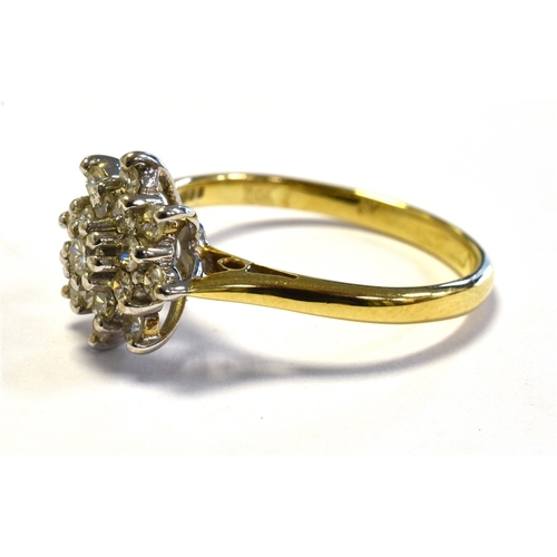 24 - 18CT GOLD & DIAMOND RING with a 10.7mm claw set basket, holding a cluster of single cut and one roun... 