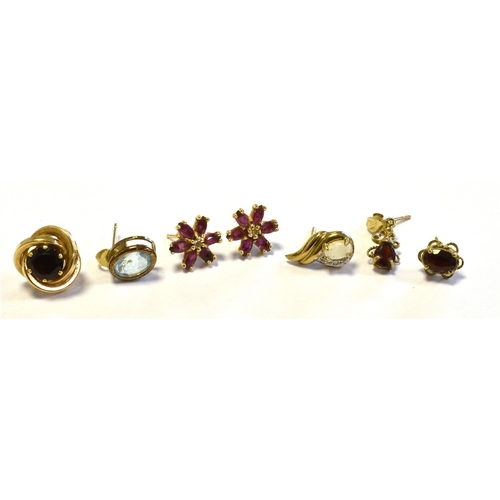 33 - ASSORTED 9CT GOLD GEM SET EARRINGS to include a pair of ruby and diamond set floral cluster studs, a... 