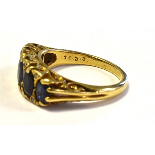 4 - 18CT GOLD SAPPHIRE & DIAMOND RING Five oval claw set sapphires, of good quality, flanked by eight si... 