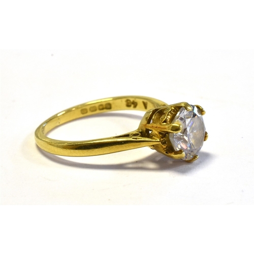 42 - 18CT GOLD & COLOURLESS STONE RING Matthey claw style setting, containing a brilliant cut colourless ... 