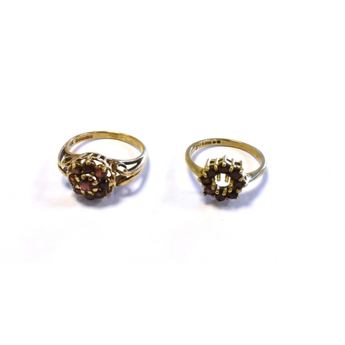 44 - 9CT GOLD & PYROPE GARNET RINGS both of floral cluster design, ring sizes K & M, both hallmarked 375.... 