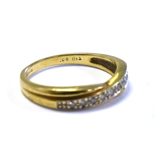 47 - 9CT GOLD & DIAMOND SET ETERNITY RING a cross over band style head, grain set with round brilliant cu... 