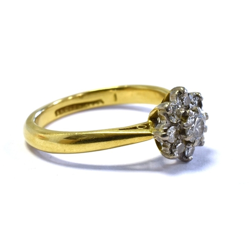 55 - 18CT GOLD & DIAMOND FLORAL CLUSTER RING set with one round brilliant cut and eight single cut diamon... 