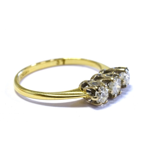 57 - 18CT THREE STONE OLD CUT DIAMOND RING platinum claw set with old cut diamonds, reported to total 0.3... 