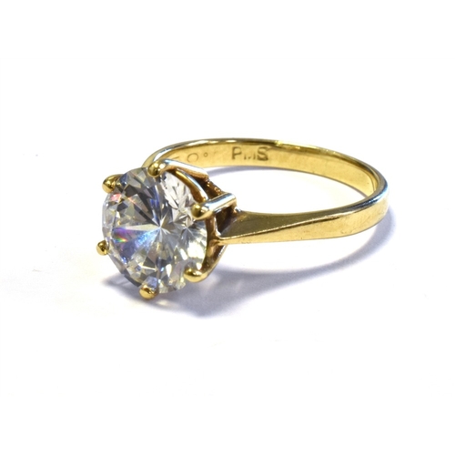 62 - 9CT GOLD SOLITAIRE RING claw set with a round brilliant cut cubic zirconia stone, ring size M, hallm... 