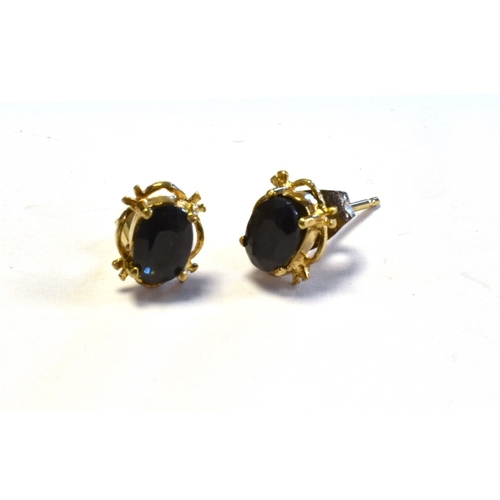 69 - 9CT GOLD & SAPPHIRE STUD EARRINGS claw set 6.0 x 4.0mm oval cut sapphires, on wire posts.  Weight 1.... 