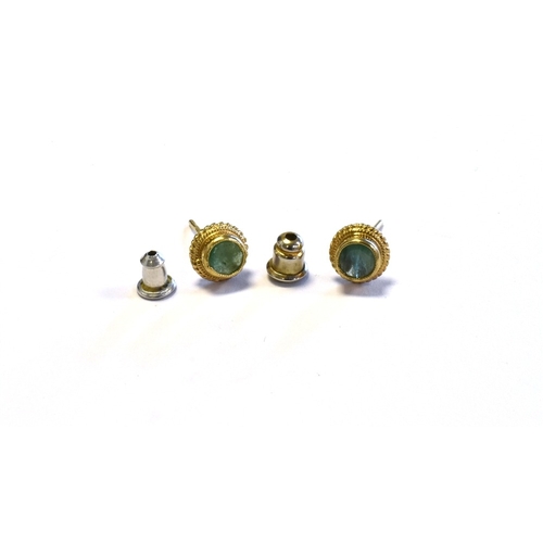 70 - 9CT GOLD EMERALD STUD EARRINGS collet set, round cut emeralds raised above a rope edged frame on wir... 