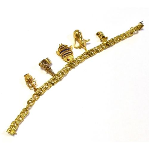 9 - 18CT GOLD CHARM BRACELET 19cm long x 7.3mm wide, double curb link chain with concealed box clasp and... 