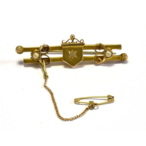 23 - ANTIQUE 15CT GOLD & SEED PEARL BROOCH 5.0cm x 1.3cm wide double bar brooch with heraldic shield moti... 