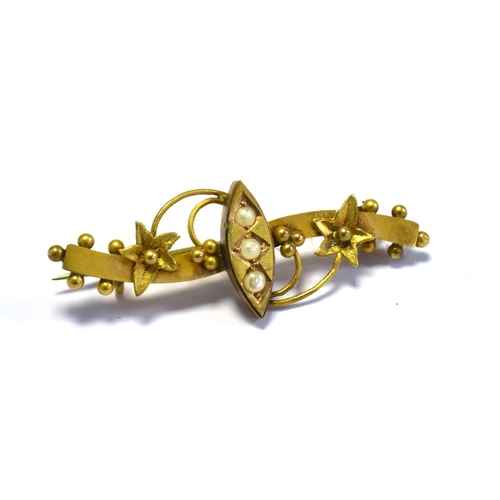 24 - EDWARDIAN 9CT GOLD BAR BROOCH 4.0cm long x 1.5cm wide, set with seed pearl cabochons on a wire pin a... 