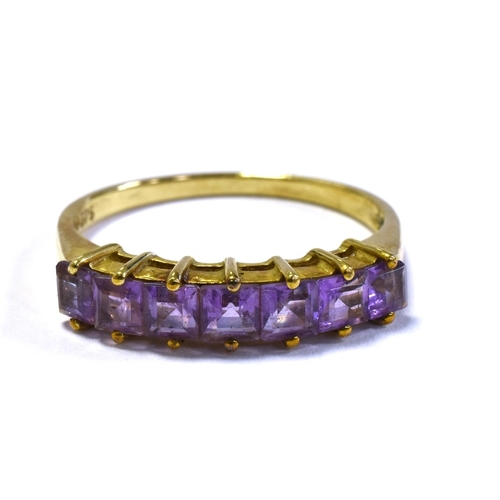 46 - 9CT GOLD & AMETHYST SEVEN STONE RING claw set with carre cut amethysts, ring size P 1/2, stamped '37... 