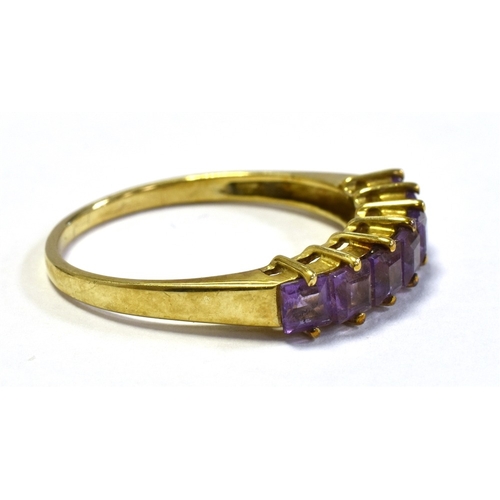 46 - 9CT GOLD & AMETHYST SEVEN STONE RING claw set with carre cut amethysts, ring size P 1/2, stamped '37... 