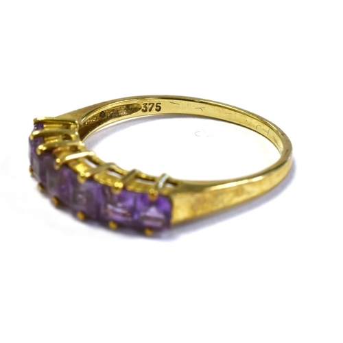 46 - 9CT GOLD & AMETHYST SEVEN STONE RING claw set with carre cut amethysts, ring size P 1/2, stamped '37... 