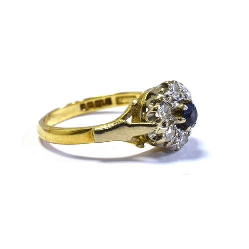 47 - 18CT GOLD SAPPHIRE & DIAMOND RING 9.2mm round cluster head, set with a round sapphire and single cut... 