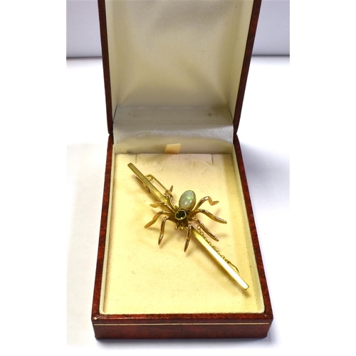 50 - VINTAGE 9CT GOLD GEM SET SPIDER BROOCH 7.6cm long bar, with a central spider motif, set with a very ... 