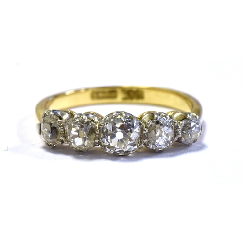 51 - 18CT OLD CUT DIAMOND FIVE STONE RING five platinum coronet claw settings, containing old mine and ol... 