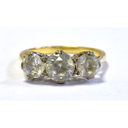 53 - 18CT GOLD THREE STONE RING Three white gold claw settings, containing quartz stones, with a yellow g... 