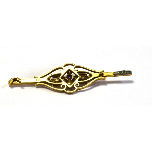 57 - 15CT GOLD GARNET & PEARL BAR BROOCH 5cm long, floral and foliate motif decorated with collet set gar... 