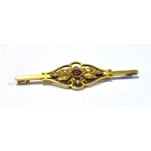 57 - 15CT GOLD GARNET & PEARL BAR BROOCH 5cm long, floral and foliate motif decorated with collet set gar... 