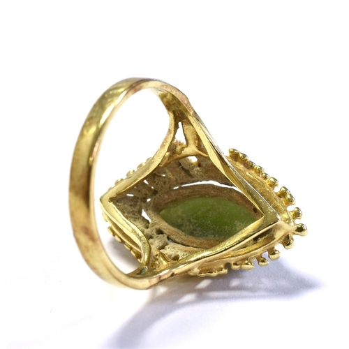 58 - 10CT GOLD & NEPHRITE JADE RING central claw set navette shaped nephrite jade cabochon, within wire w... 