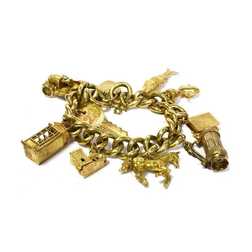 63 - HEAVY 9CT GOLD CHARM BRACELET 18cm long x 12.7mm wide, solid curb link bracelet hallmarked 375 Londo... 