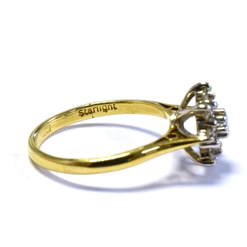 69 - 18CT GOLD & DIAMOND RING with a 10.7mm claw set basket, holding a cluster of single cut and one roun... 