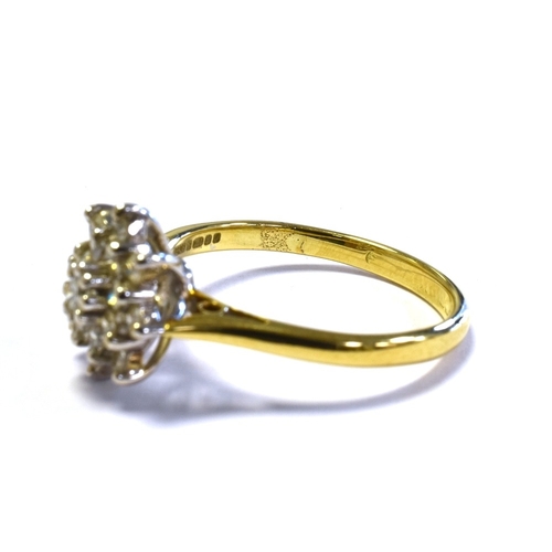 69 - 18CT GOLD & DIAMOND RING with a 10.7mm claw set basket, holding a cluster of single cut and one roun... 