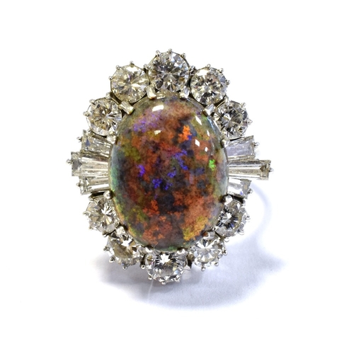 73 - 18CT WHITE GOLD OPAL & DIAMOND RING 23.5 x 20.9mm ballerina style head, set with an Andamooka matrix... 