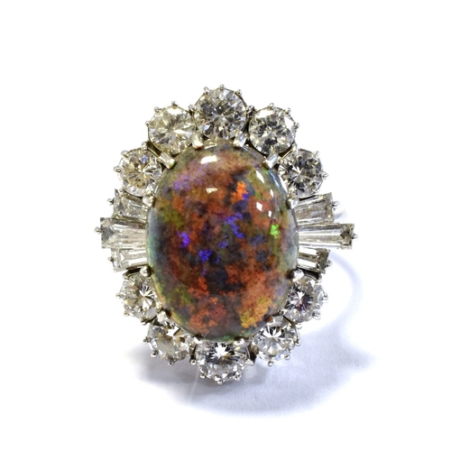 73 - 18CT WHITE GOLD OPAL & DIAMOND RING 23.5 x 20.9mm ballerina style head, set with an Andamooka matrix... 