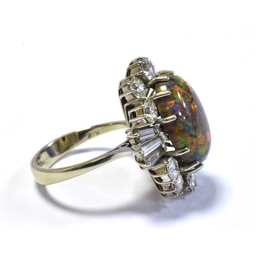 73 - 18CT WHITE GOLD OPAL & DIAMOND RING 23.5 x 20.9mm ballerina style head, set with an Andamooka matrix... 