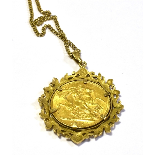 76 - SOVEREIGN COIN PENDANT ON 9CT GOLD CHAIN the sovereign dated 1911, spectacle set in an intricate scr... 