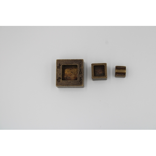 53 - This antique bronze square seal is a unique piece, featuring three distinct seals within its design.... 