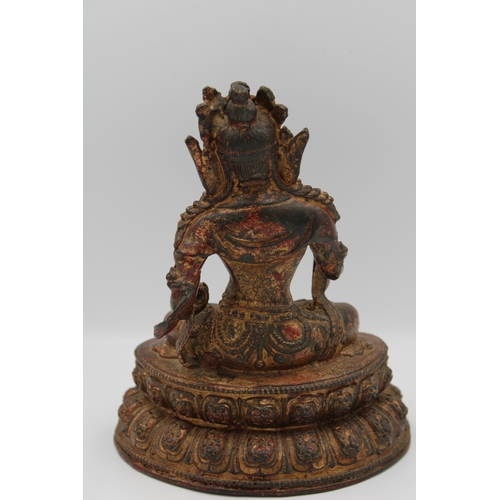 56 - A Chinese Tibetan bronze Buddha figurine in cross legged meditative position on lotus base.

Roughly... 