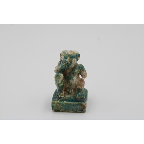 278 - Egyptian Ptolemaic or later era, depicts a squatting man.

height: 4 cm