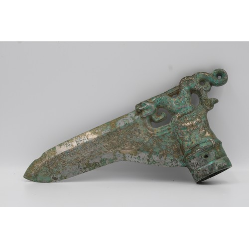 66 - Shang Bronze dagger with dragon and phoenix decoration.

Around 25.5cm long