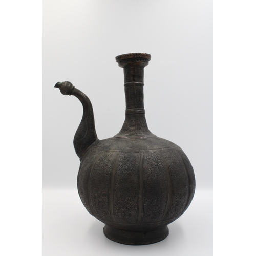 87 - Islamic Water Jug: Exquisite Patterned Design

Roughly 30 cm