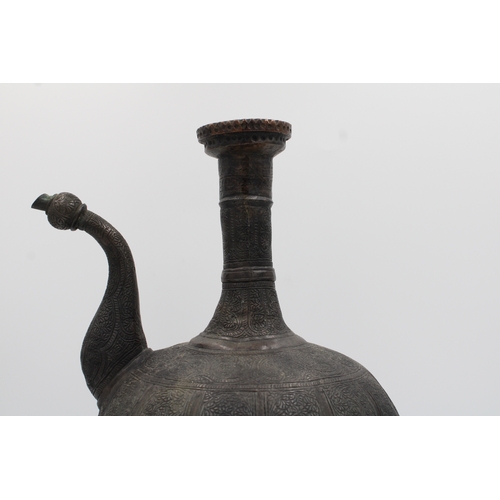 87 - Islamic Water Jug: Exquisite Patterned Design

Roughly 30 cm