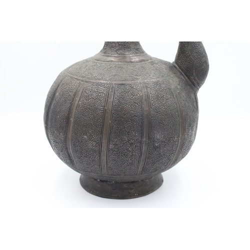 87 - Islamic Water Jug: Exquisite Patterned Design

Roughly 30 cm