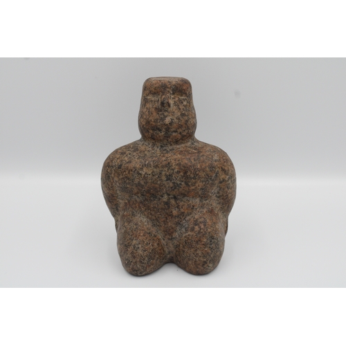 283 - Granite figurine likely originating from Central Asia.

13cm tall